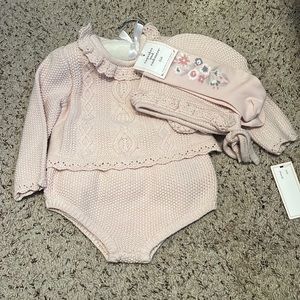 Beautiful sweater set with matching bonnet and knee socks.